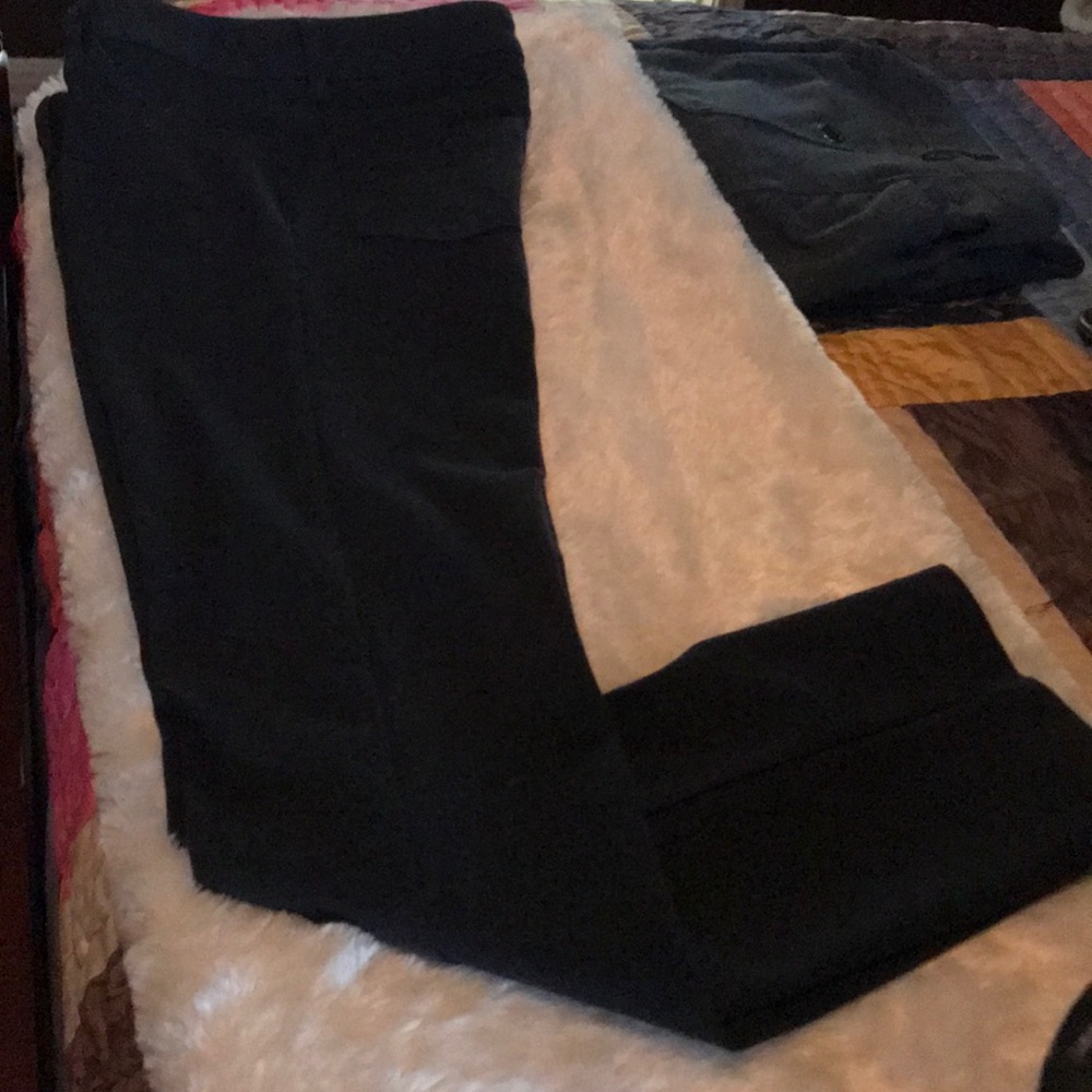 Women’s dark grey skinny pants.  Never worn.  NWOT